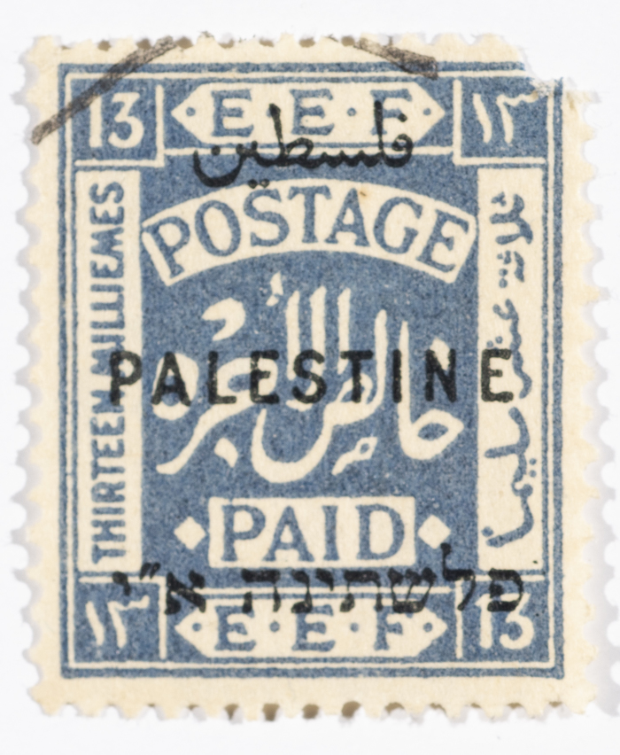 A postage stamp used in Palestine during the British Mandate
