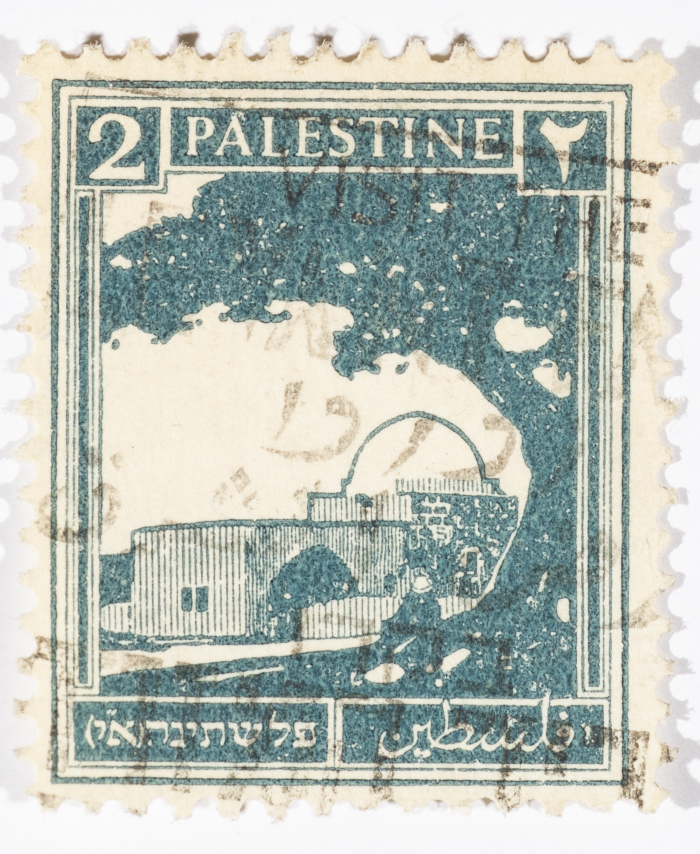 A postage stamp used in Palestine during the British Mandate
