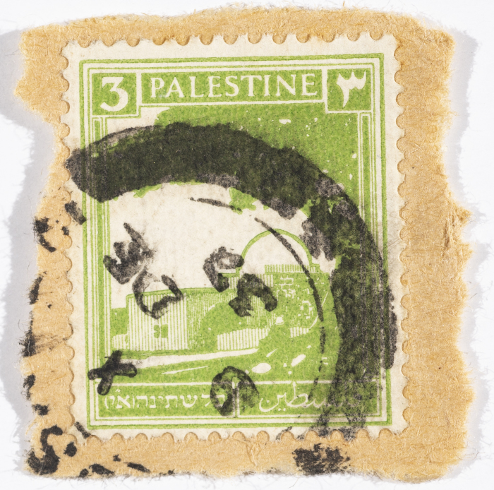 A postage stamp used in Palestine during the British Mandate