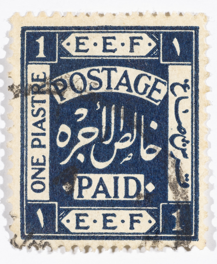 A postage stamp used in Palestine during the British Mandate