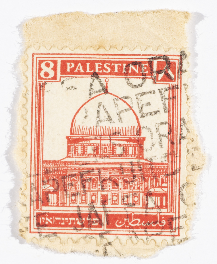 A postage stamp used in Palestine during the British Mandate
