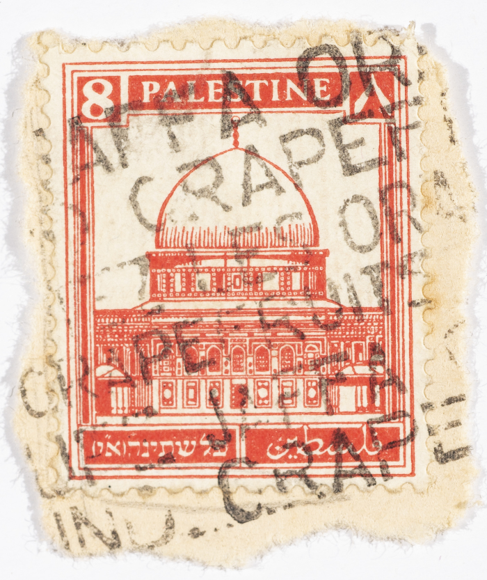 A postage stamp used in Palestine during the British Mandate