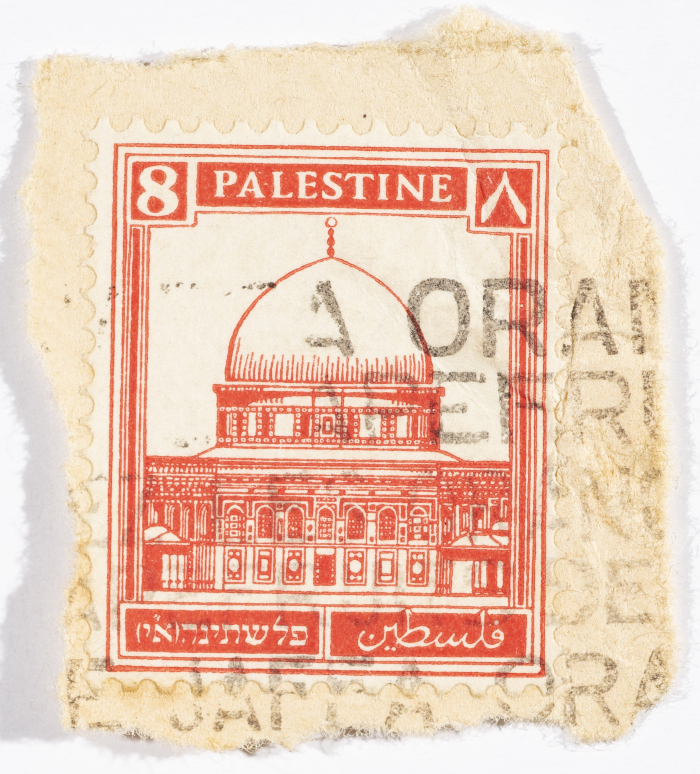 A postage stamp used in Palestine during the British Mandate