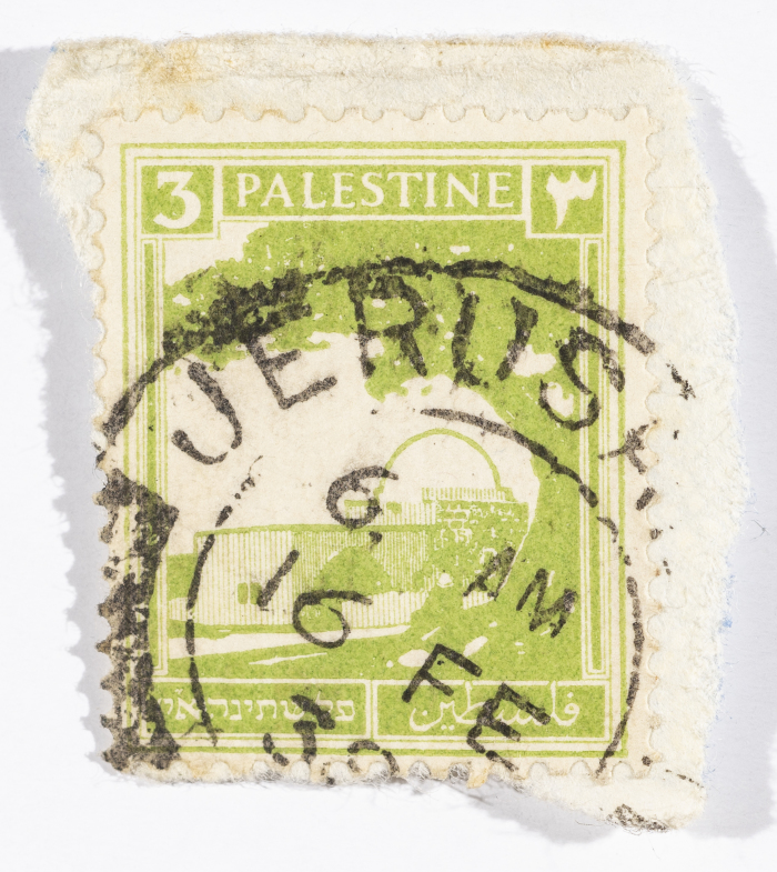 A postage stamp used in Palestine during the British Mandate