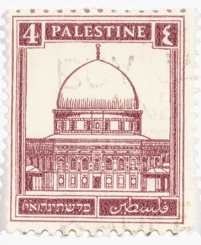 A postage stamp used in Palestine during the British Mandate