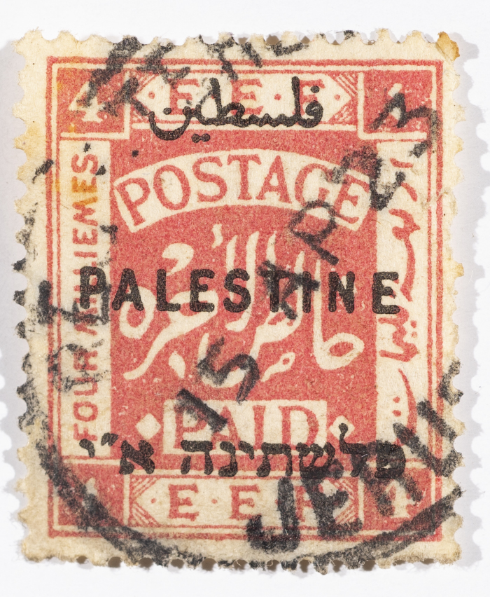 A postage stamp used in Palestine during the British Mandate