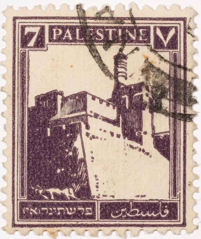 A postage stamp used in Palestine during the British Mandate