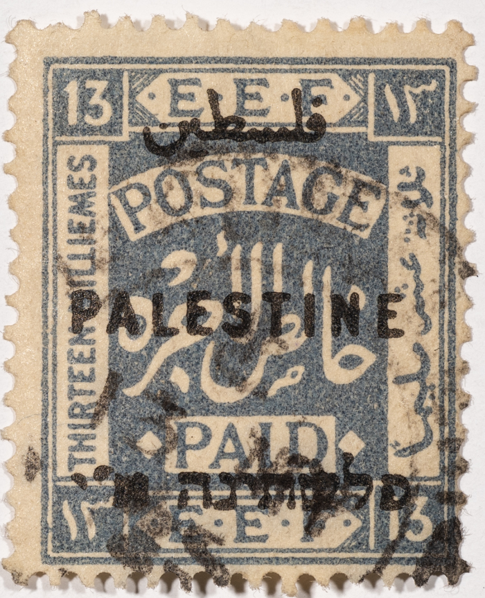 A postage stamp used in Palestine during the British Mandate