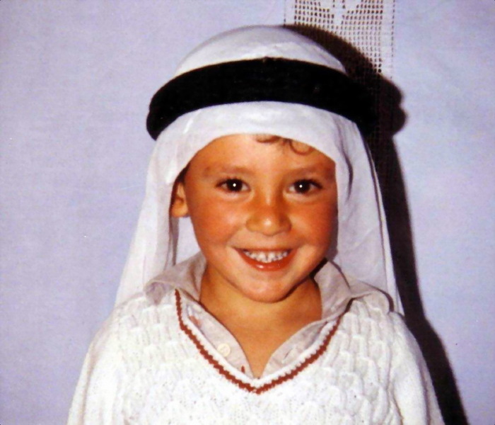 A child wearing traditional clothes