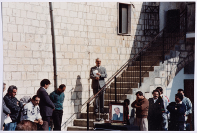 Tawfiq Ziad in the funeral of Massad Kassis