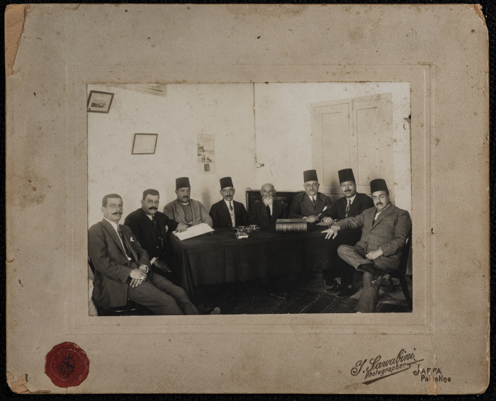 A group photograph of Abdel-Raheem al-Husseini, Abu Khadra, members of Dajani Family, and others