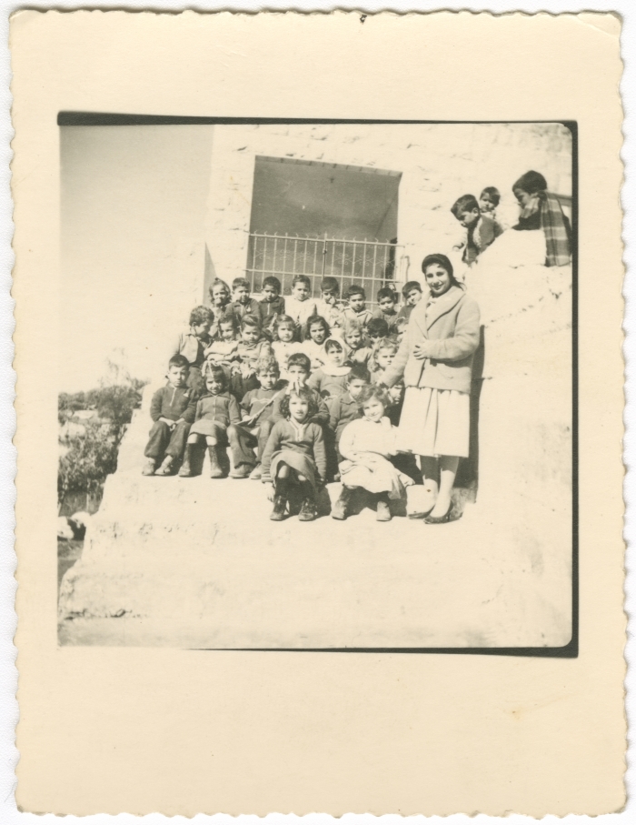 A teacher with her students