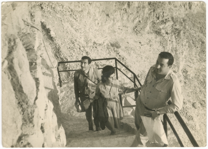 A Photo of two men and a woman