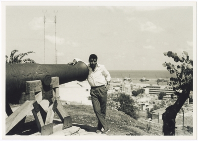 Ibrahim Hijazi in front of the Acre cannon in the municipal park