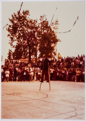 The Headmaster of the Friends School, Fuad al-Zaru Performing a Stilts Walk  