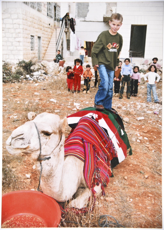 A Photograph of a Group of Children in Raʾs al-ʿĀrud in Sa'ir