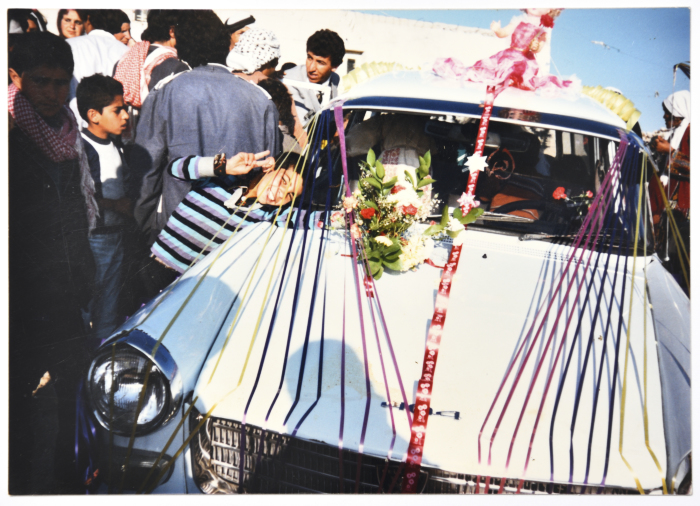 A Photograph of a Decorated Wedding Car in Sa'ir
