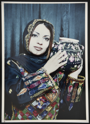 A young woman wearing the traditional Palestinian costume