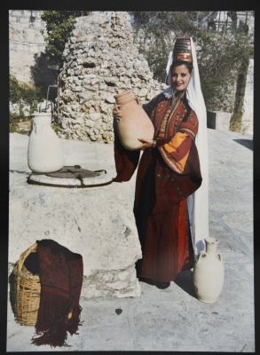 A young woman wearing the traditional Palestinian costume