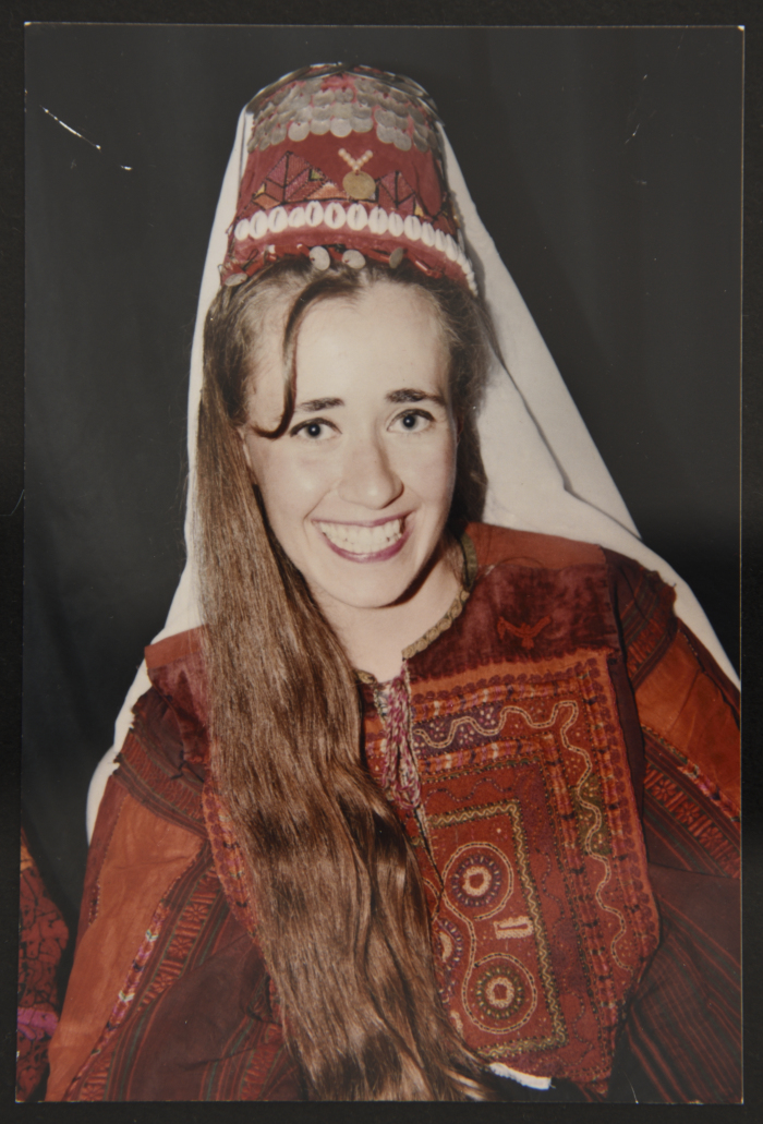 A young woman wearing the traditional Palestinian costume