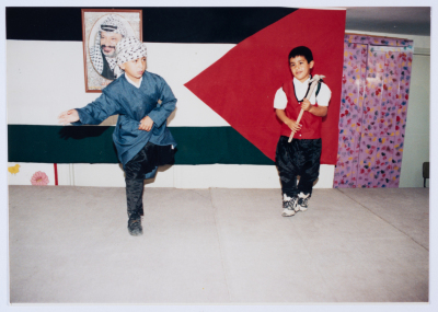 A celebration at the kindergarten of Qalandiya Camp Women Handicraft Cooperative Society