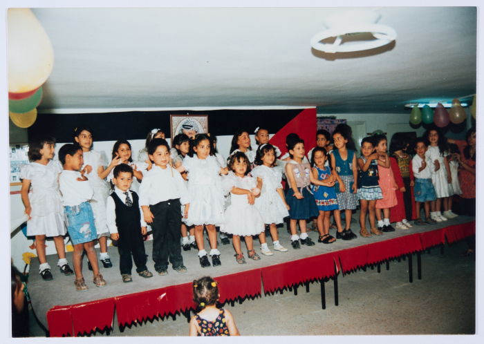 A celebration at the kindergarten of Qalandiya Camp Women Handicraft Cooperative Society