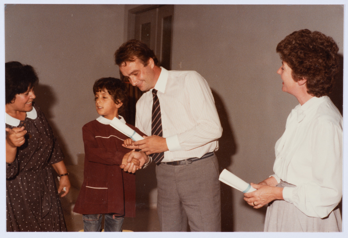 Handing certificates at the graduation ceremony of the kindergarten of Qalandiya Camp Women Handicraft Cooperative Society