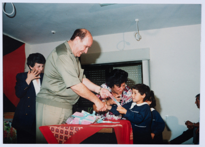 Handing certificates at the graduation ceremony of the kindergarten of Qalandiya Camp Women Handicraft Cooperative Society