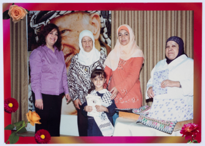 A celebration at the kindergarten of Qalandiya Camp Women Handicraft Cooperative Society