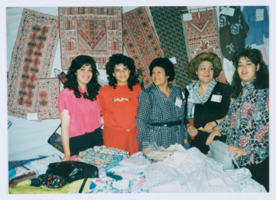 Qalandiya Camp Women Handicraft Cooperative Society participating in a local exhibition of Palestinian embroidery and heritage