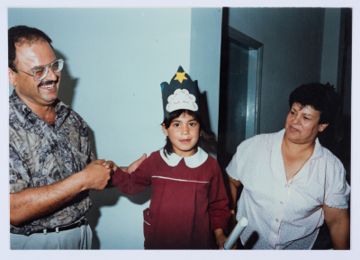 Handing certificates at the graduation ceremony of the kindergarten of Qalandiya Camp Women Handicraft Cooperative Society