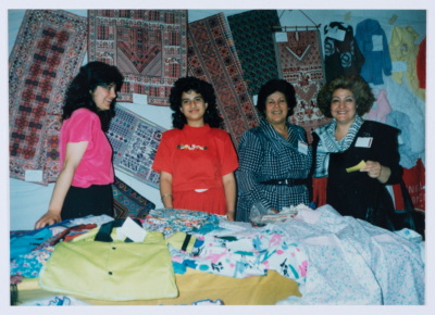 Qalandiya Camp Women Handicraft Cooperative Society participating in a local exhibition of Palestinian embroidery and heritage