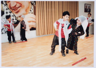 A celebration at the kindergarten of Qalandiya Camp Women Handicraft Cooperative Society