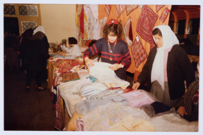 Qalandiya Camp Women Handicraft Cooperative Society participating in a local exhibition of Palestinian embroidery and heritage
