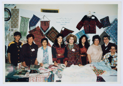 Qalandiya Camp Women Handicraft Cooperative Society participating in a local exhibition of Palestinian embroidery and heritage