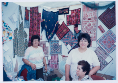 Qalandiya Camp Women Handicraft Cooperative Society participating in a local exhibition of Palestinian embroidery and heritage