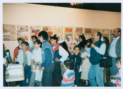 Children of Qalandiya Camp Women Handicraft Cooperative Society participating in an exhibition of visual arts in 1990