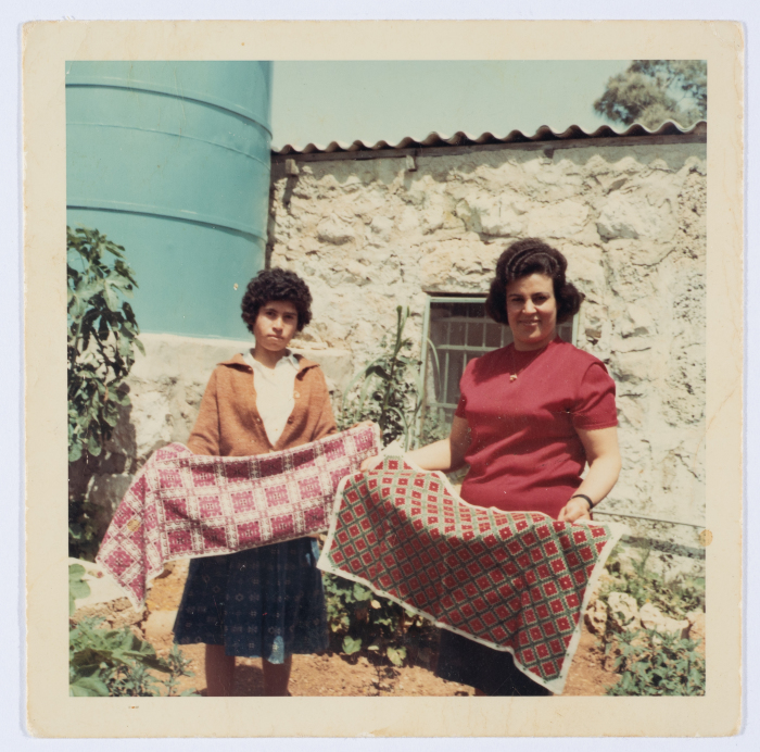 Members of the Board of Directors of Qalandiya Camp Women Handicraft Cooperative Society participating in an event