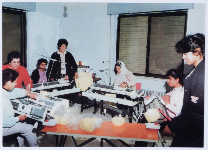 Female workers in Qalandiya Camp Women Handicraft Cooperative Society sewing factory
