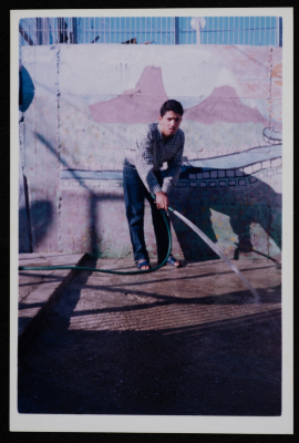 A prisoner cleaning the yard of a prison