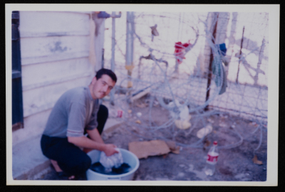 A prisoners doing his laundry in prison