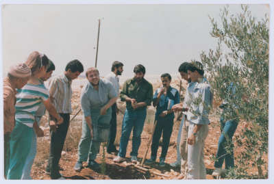 Marwan al-Barghuthy with his colleagues partaking in a tree-planting activity in Birzeit University