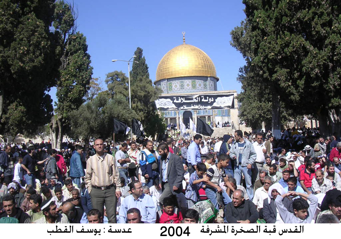 A group of people in the courtyard of Al-Aqsa Mosque