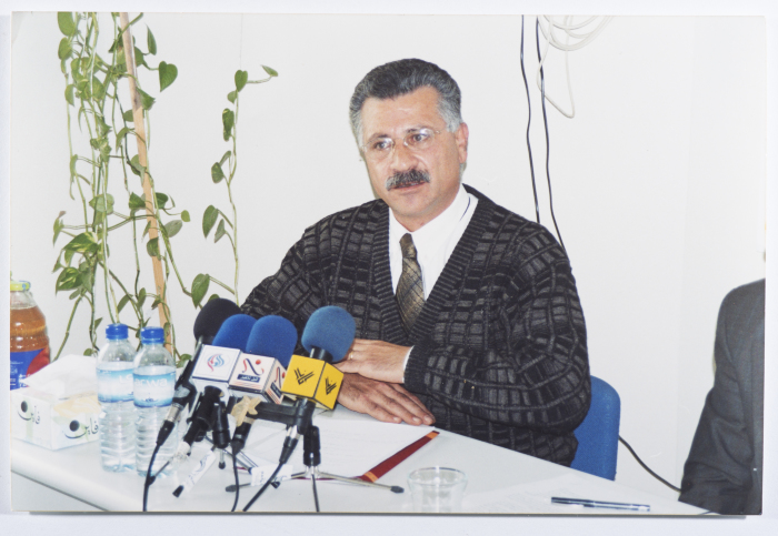 Ahmad al-Maslamany talking during a conference