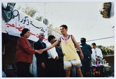 Mrs Muntaha al-Budairi Honours the Winners of the Cross-Country Race in Ramallah