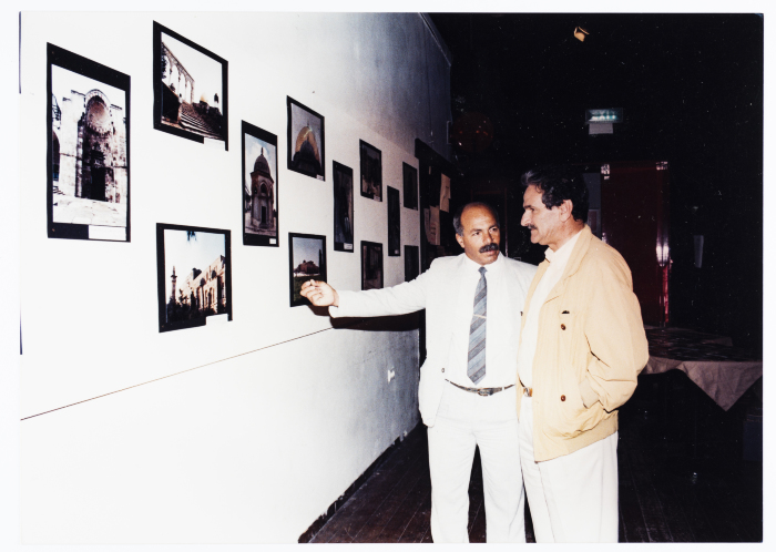 Mahmoud Shukair with Mahfouz Abu Turk during his Photography Exhibition in Jerusalem in 1997