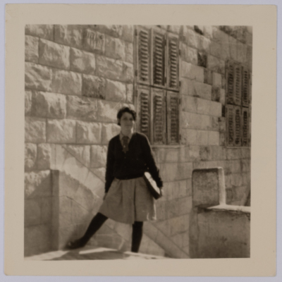 Majida al-Masry in front of her house