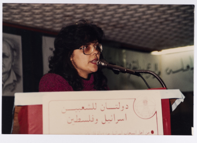A woman giving a speech